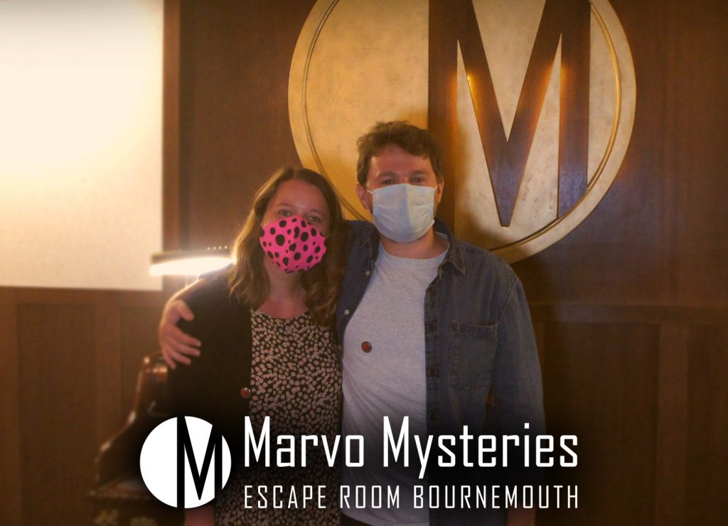 Dan posing for the camera with his partner, in the Marvo Mysteries Escape-room Bournemouth
